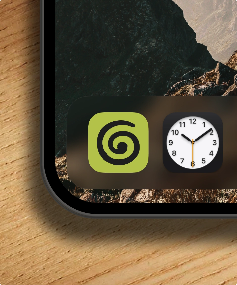 An iPhone home screen with the Granola app icon in the dock